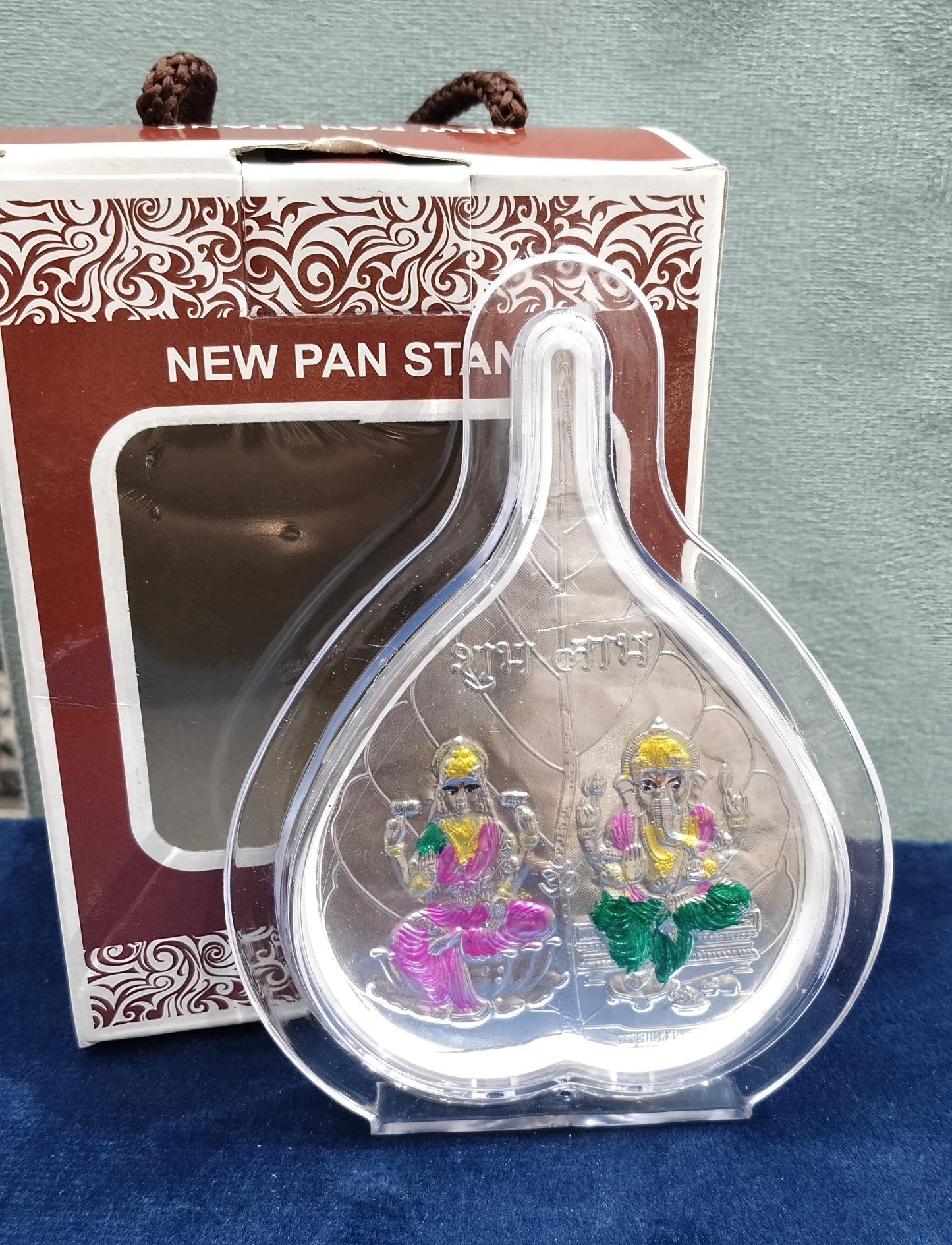 999 Pure Silver Foil Betel Leaf or Paan Frame with Colored Laxmi Ganesha Design