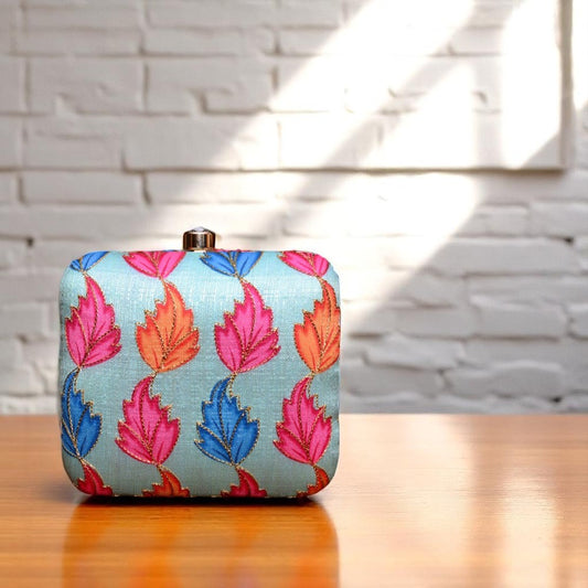 Indian Ethnic Designer Pastel Blue Clutch with Multicolored Leaf Design