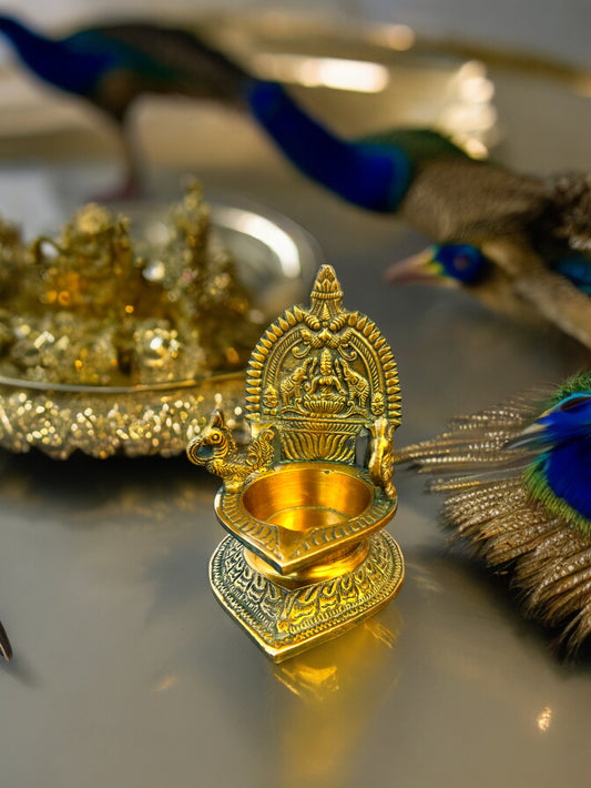 Brass Laxmi Diya with Peacock on Sides