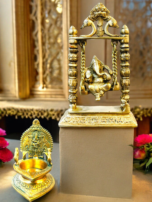 Brass Laxmi Diya with Peacock on Sides