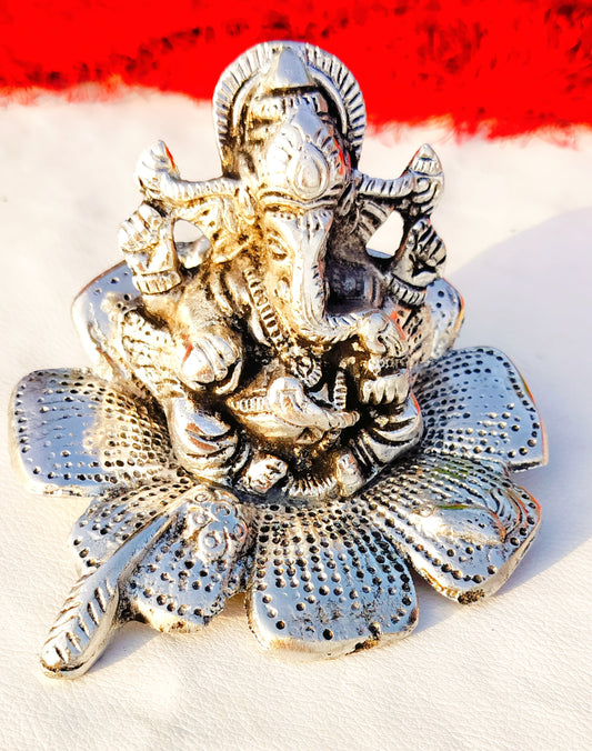 German Silver Ganesh Idol Sitting on Hibiscus Flower