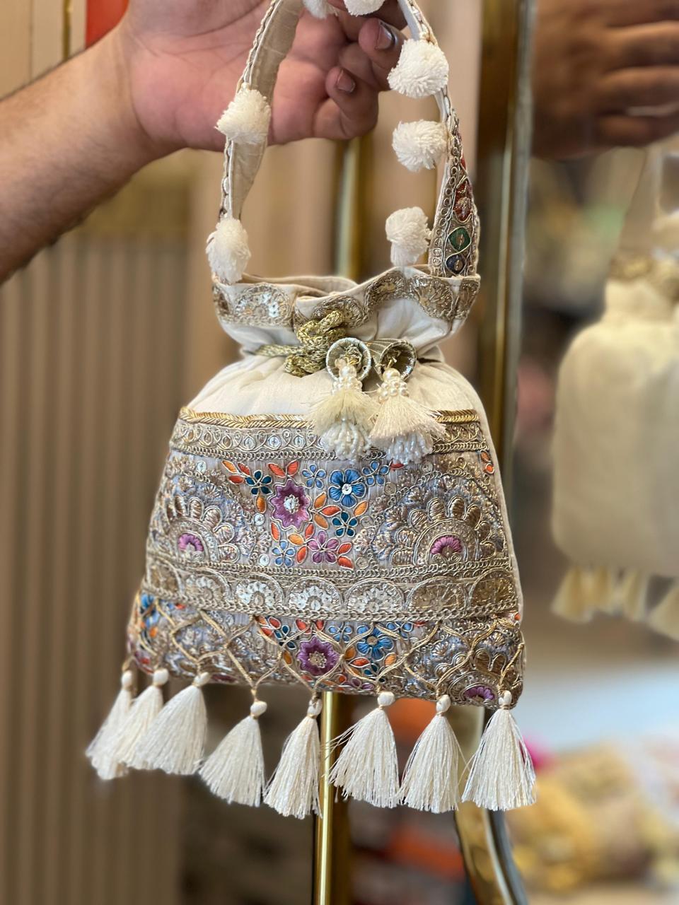 Silk Potli Bag with Hand Embroidery, Pom Pom & Tassels