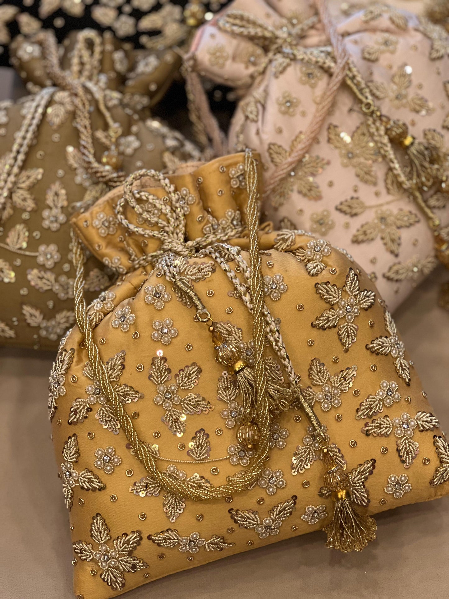 Zardosi Work Silk Potli Bag with Hand Embroidery & Designer Closing Thread
