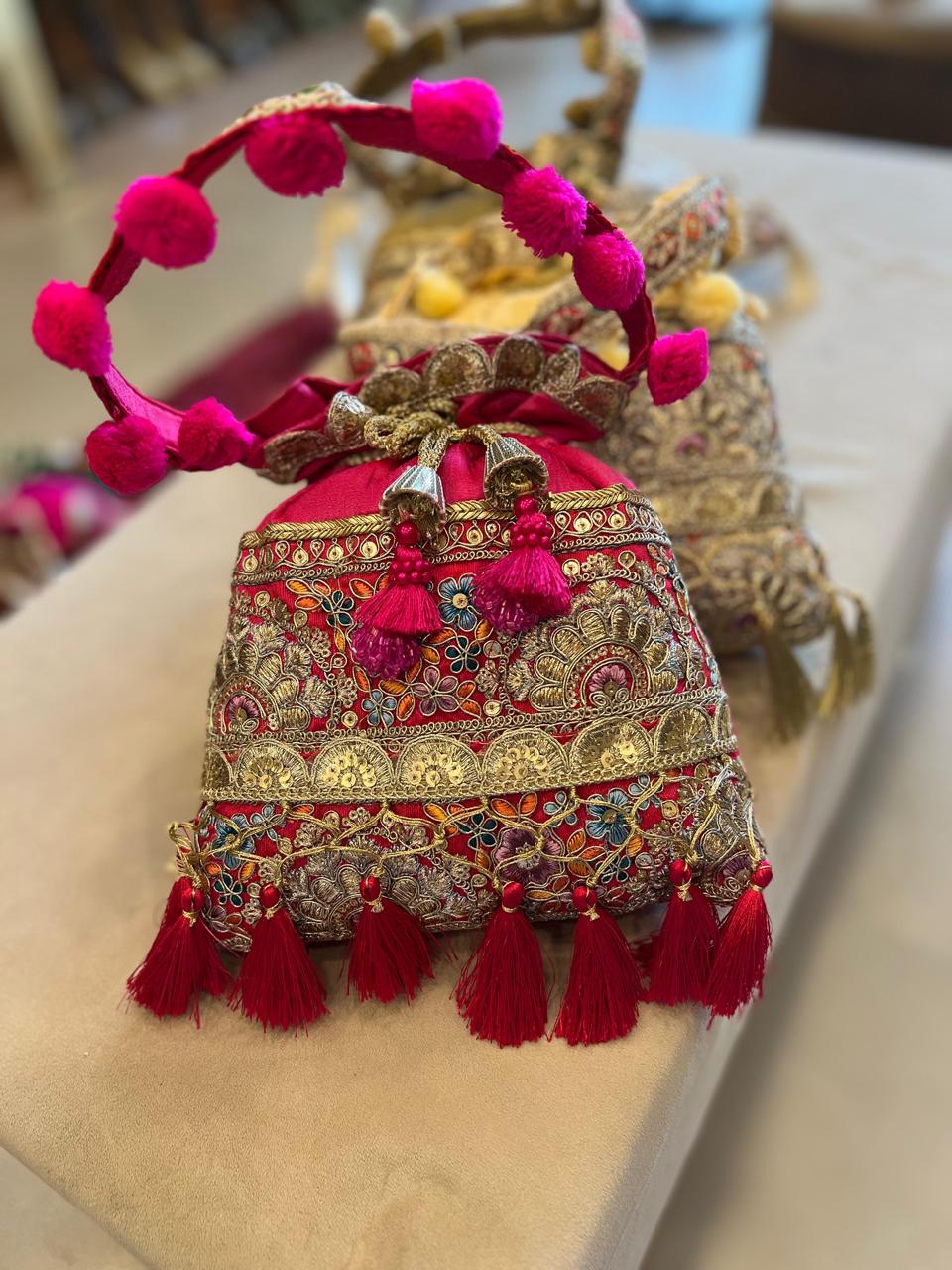 Silk Potli Bag with Hand Embroidery, Pom Pom & Tassels