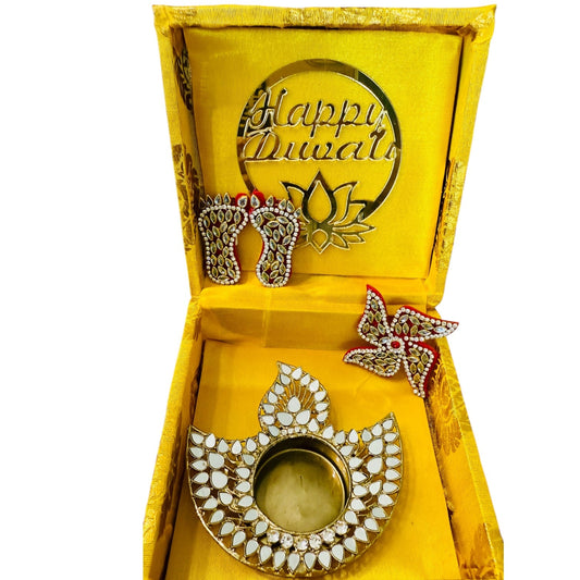 Decorative earrings in a 'Happy Diwali' themed yellow box