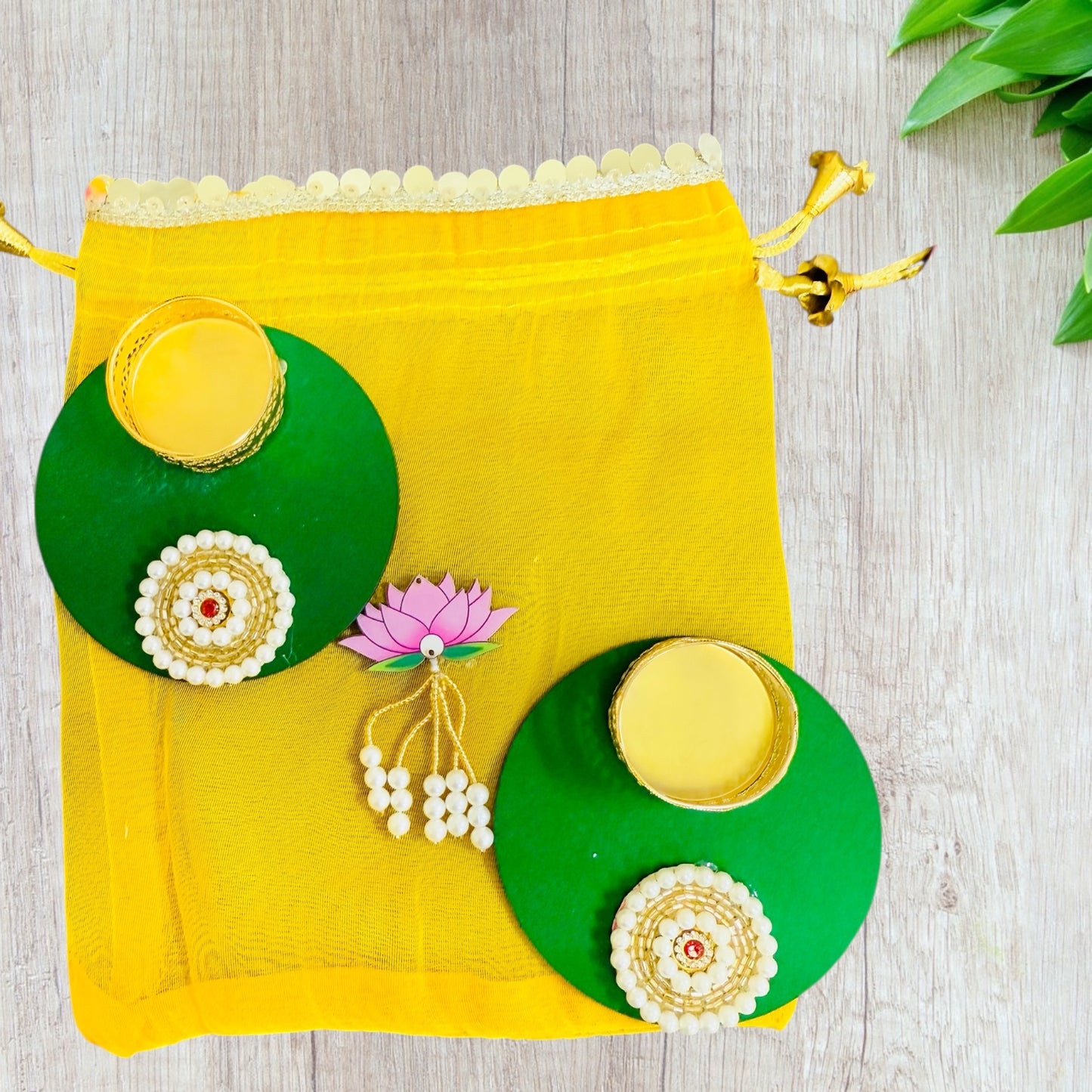 Set of 2 Round Diyas with Pearl Butti in Potli Bag