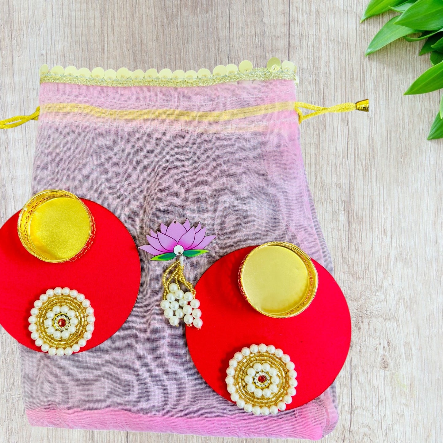 Set of 2 Round Diyas with Pearl Butti in Potli Bag