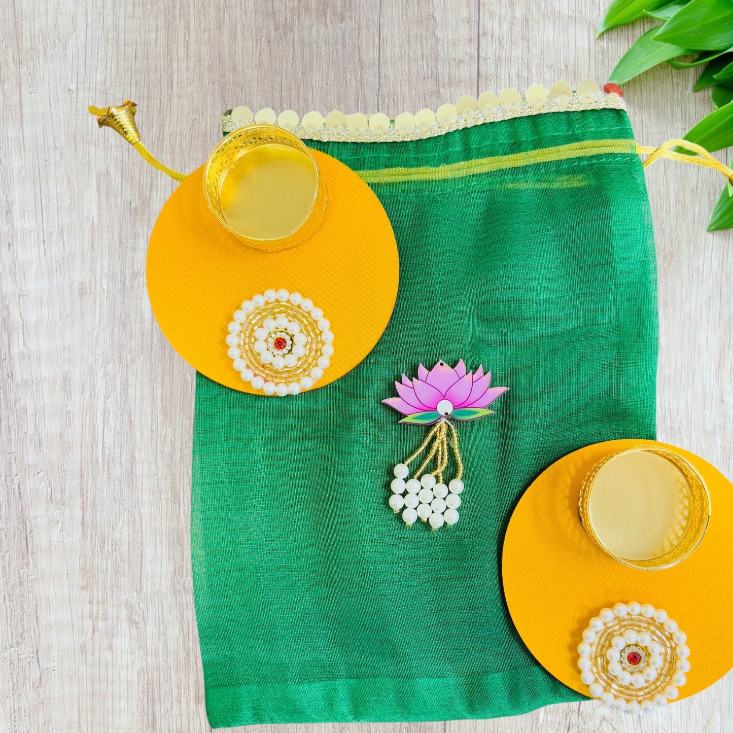Set of 2 Round Diyas with Pearl Butti in Potli Bag