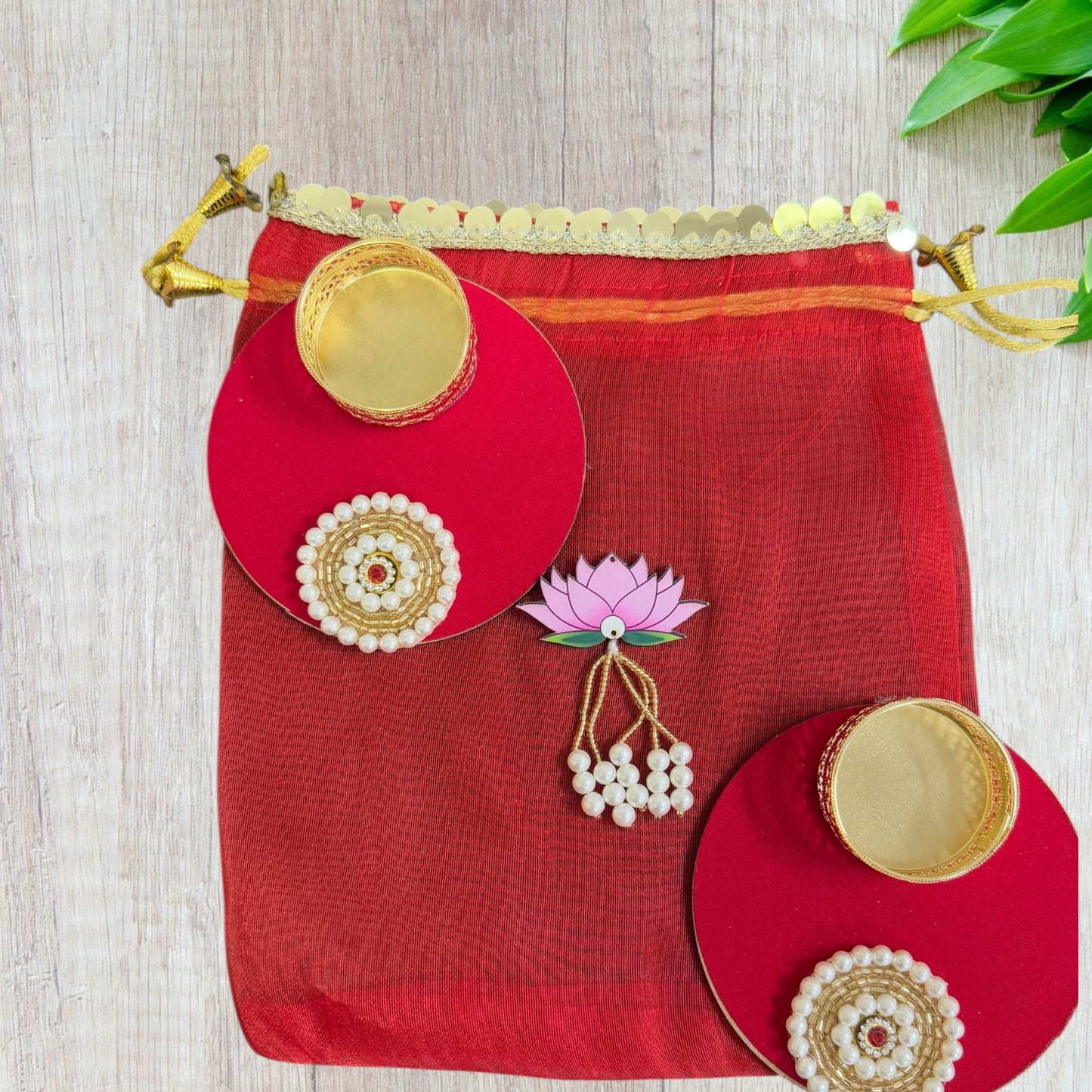 Set of 2 Round Diyas with Pearl Butti in Potli Bag