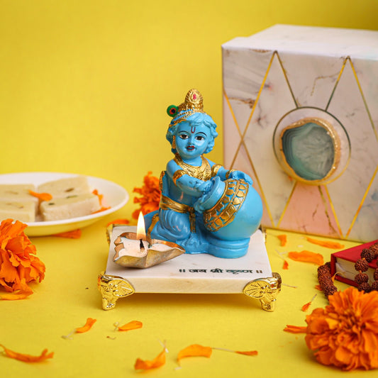 Laddu Gopal Ji on Marble Chowki