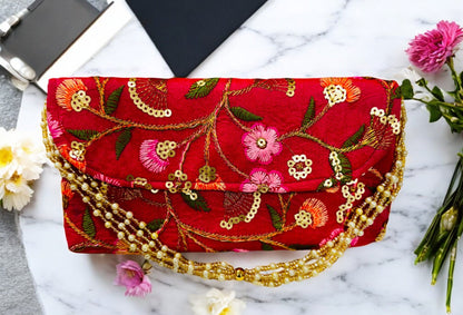 Embroidered Silk Clutch with Pearl Belt