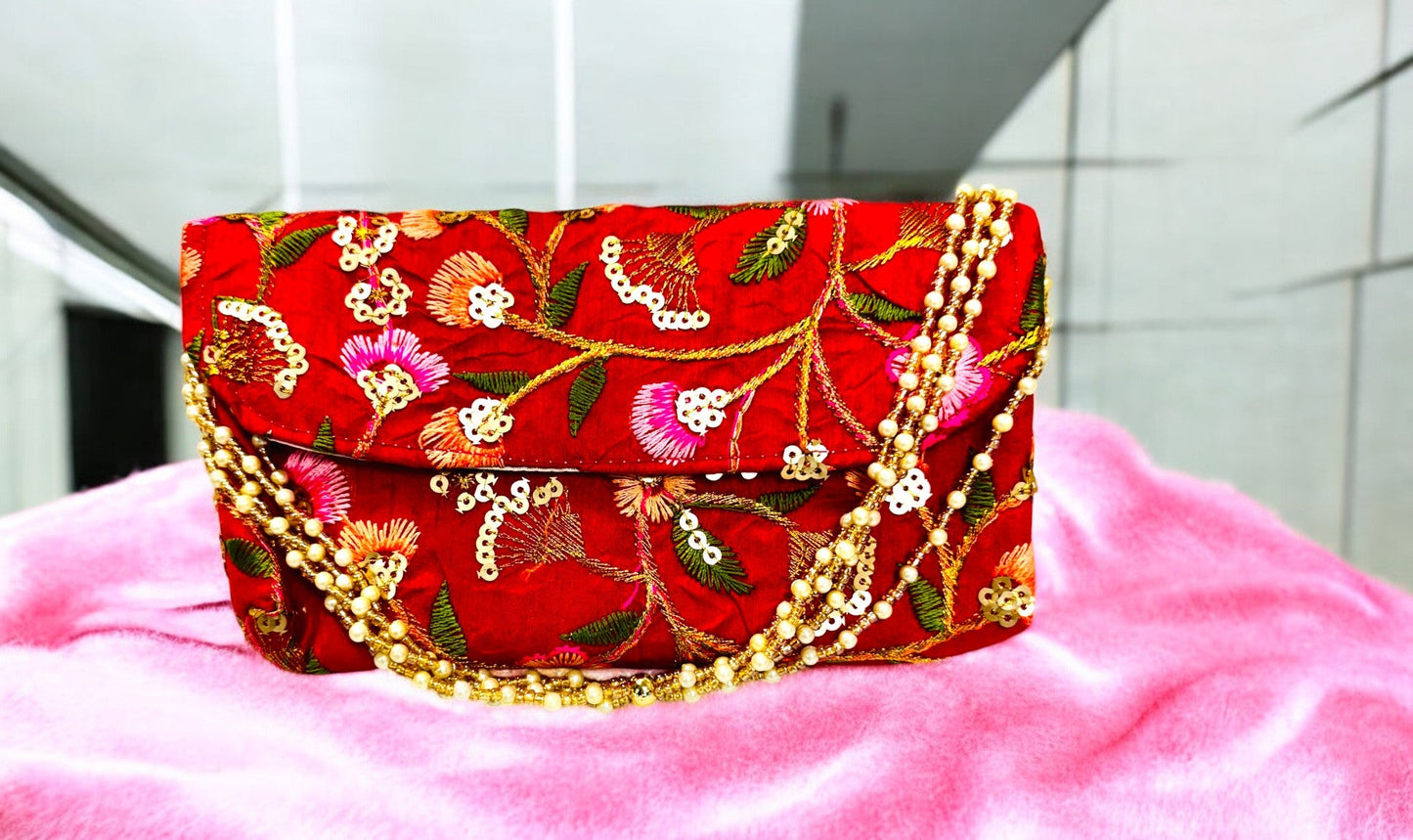 Embroidered Silk Clutch with Pearl Belt