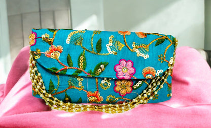 Embroidered Silk Clutch with Pearl Belt