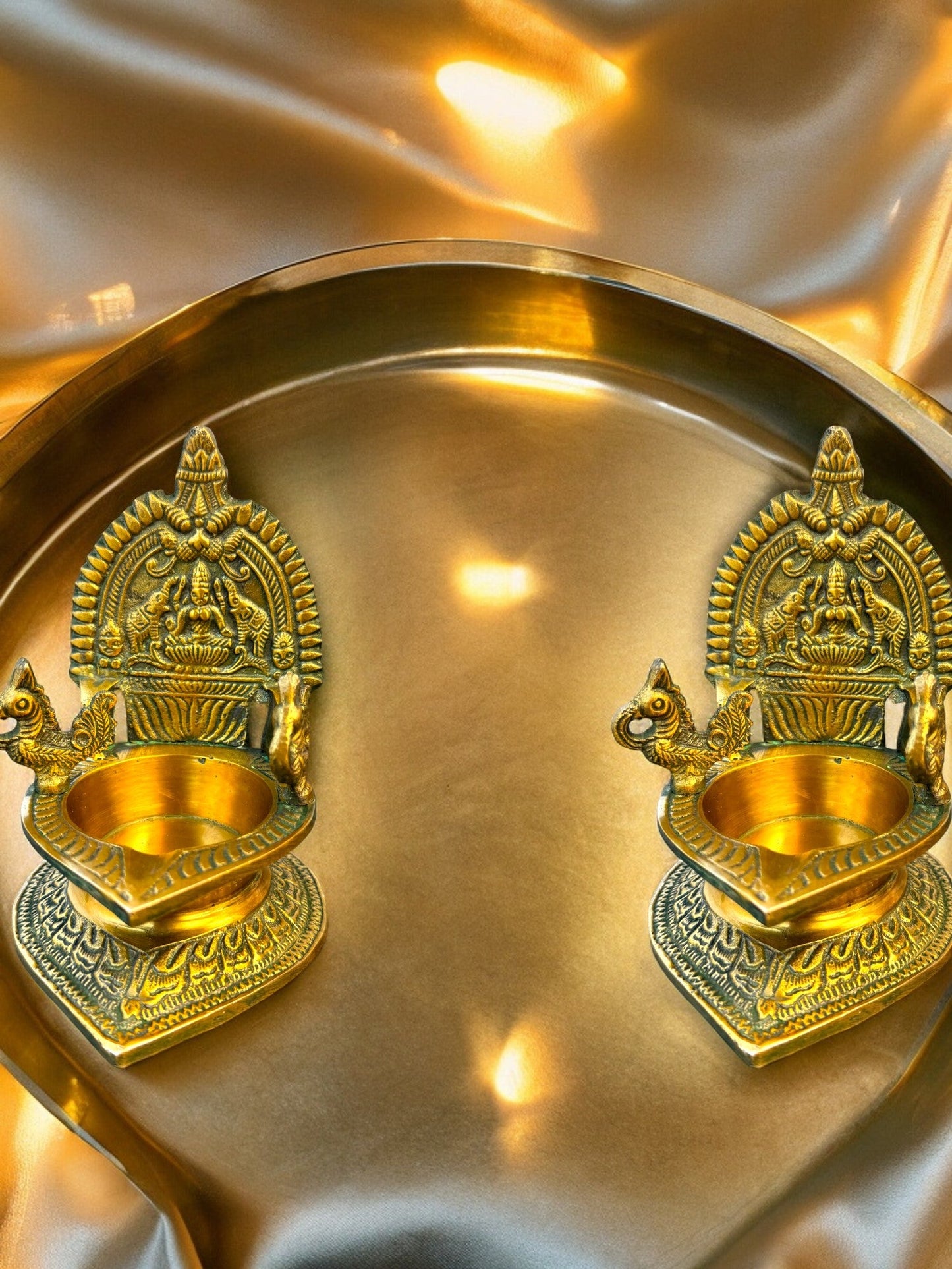 Brass Laxmi Diya with Peacock on Sides