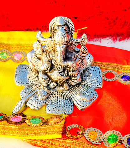 German Silver Ganesh Idol Sitting on Hibiscus Flower