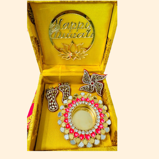 Decorative Diwali lamp with decorative elements in a yellow box with 'Happy Diwali' text.