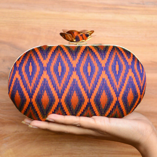 Geometric Pattern Fabric Cylindrical Shape Clutch with Designer Floral Knob
