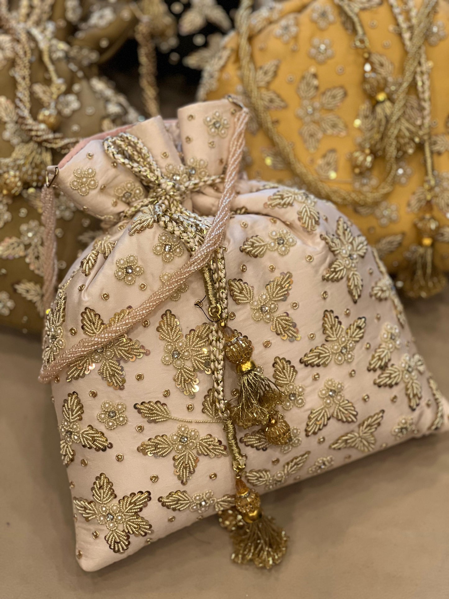 Zardosi Work Silk Potli Bag with Hand Embroidery & Designer Closing Thread
