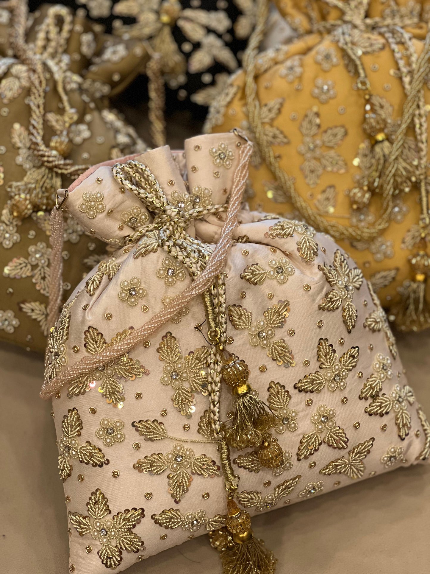 Zardosi Work Silk Potli Bag with Hand Embroidery & Designer Closing Thread