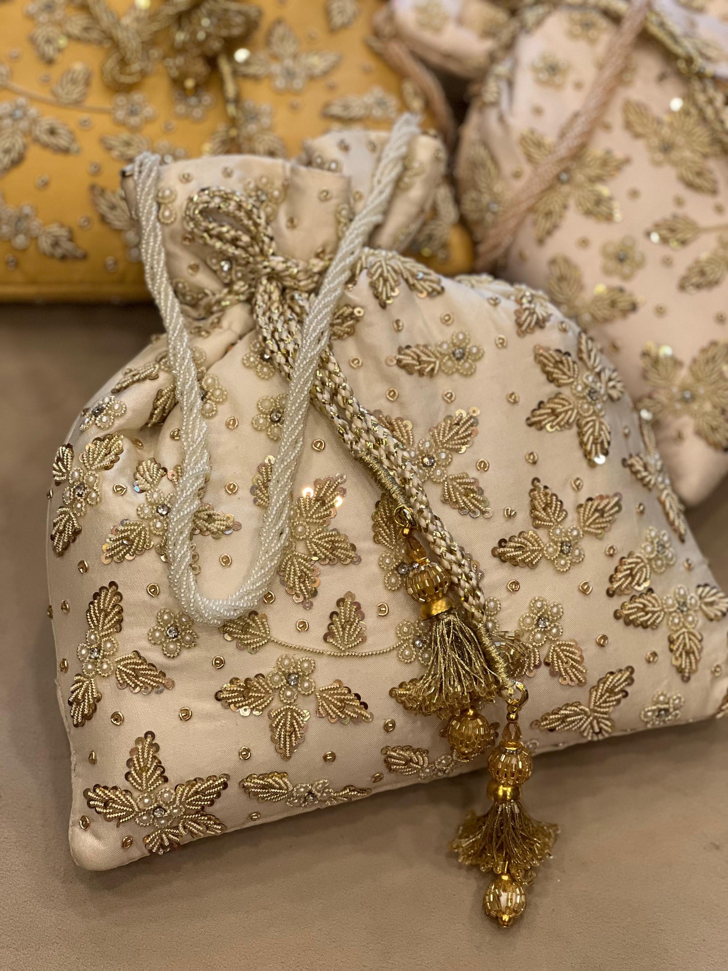 Zardosi Work Silk Potli Bag with Hand Embroidery & Designer Closing Thread