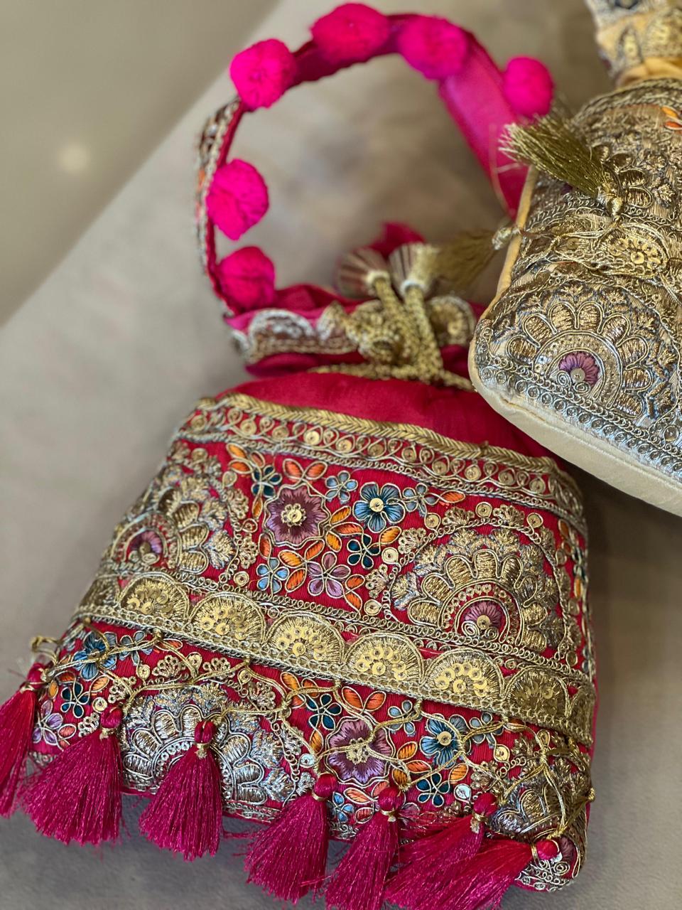 Silk Potli Bag with Hand Embroidery, Pom Pom & Tassels