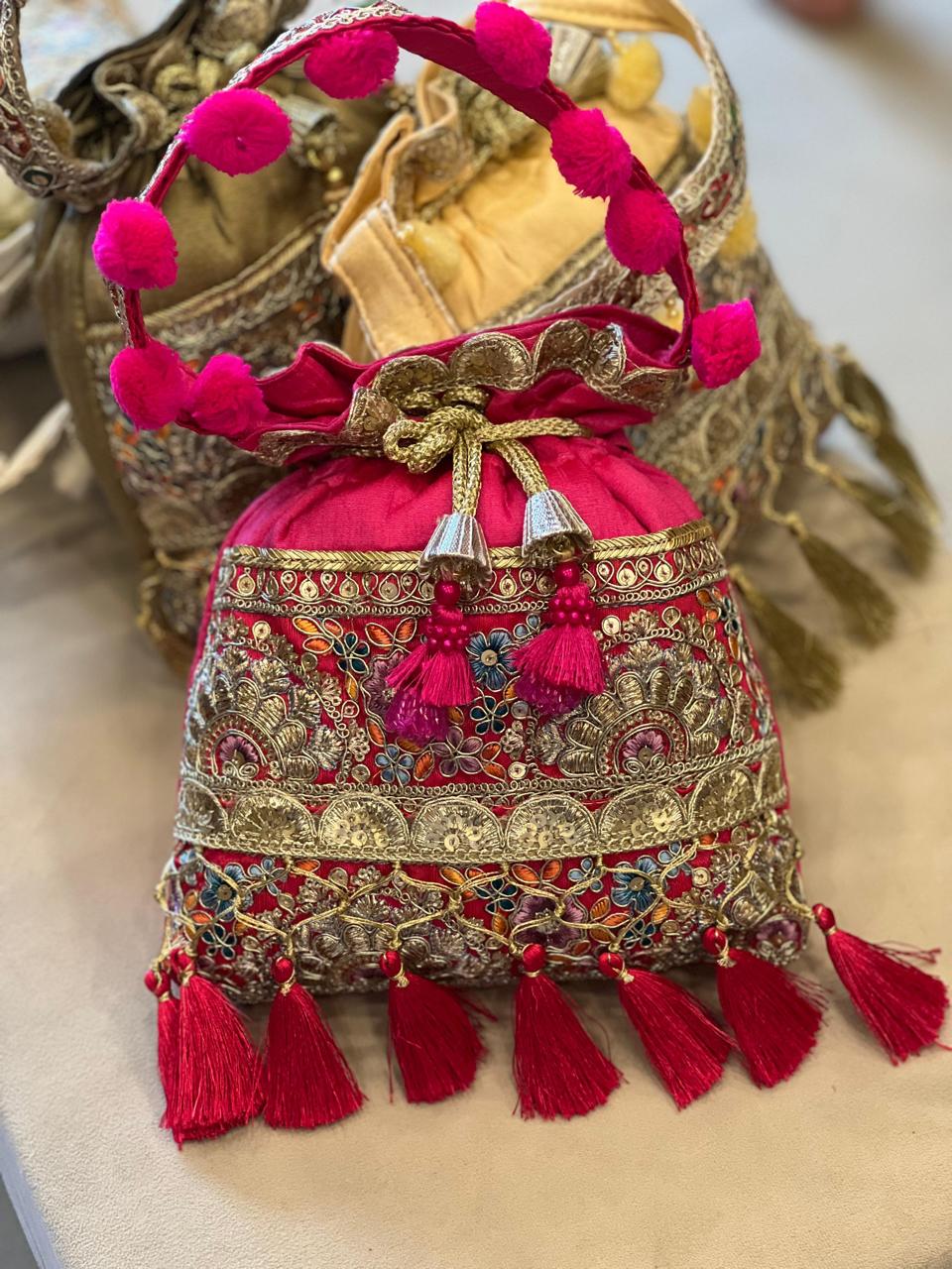 Silk Potli Bag with Hand Embroidery, Pom Pom & Tassels