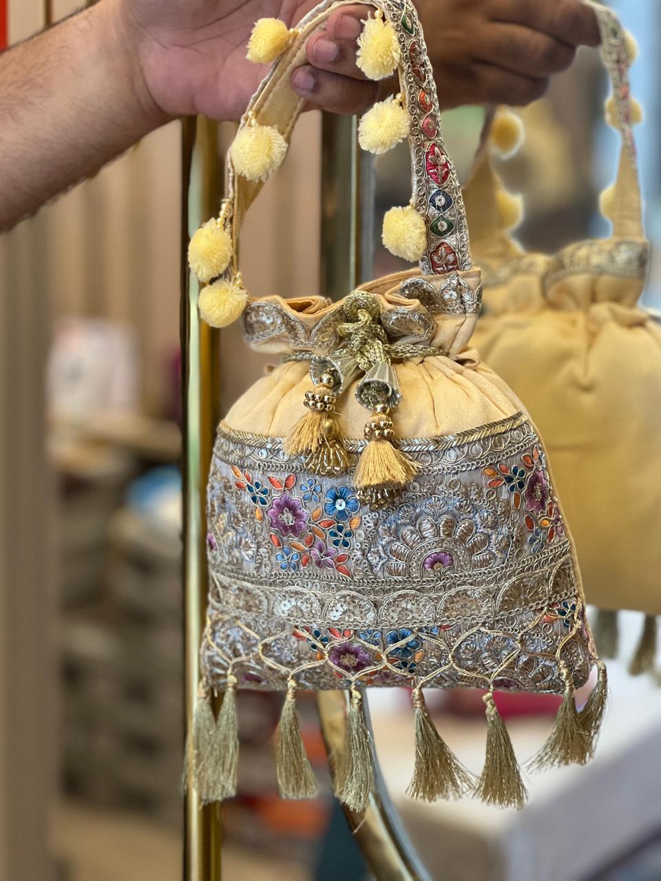 Silk Potli Bag with Hand Embroidery, Pom Pom & Tassels