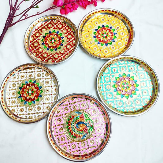 Set of five decorative plates with colorful patterns on a white background