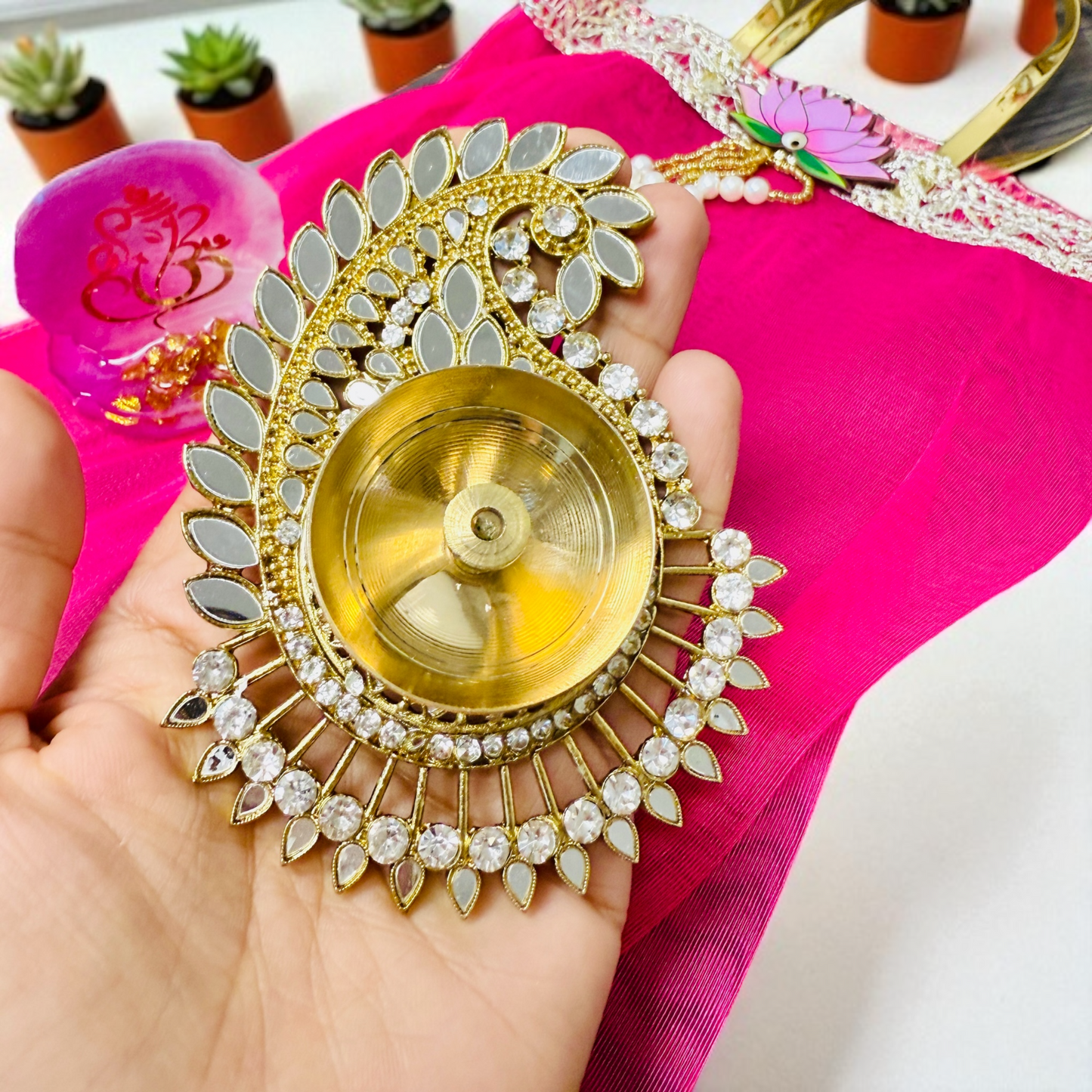 Combo of Akhand Diya, Resin Ganesha, Lotus Hanging in Organza Bag