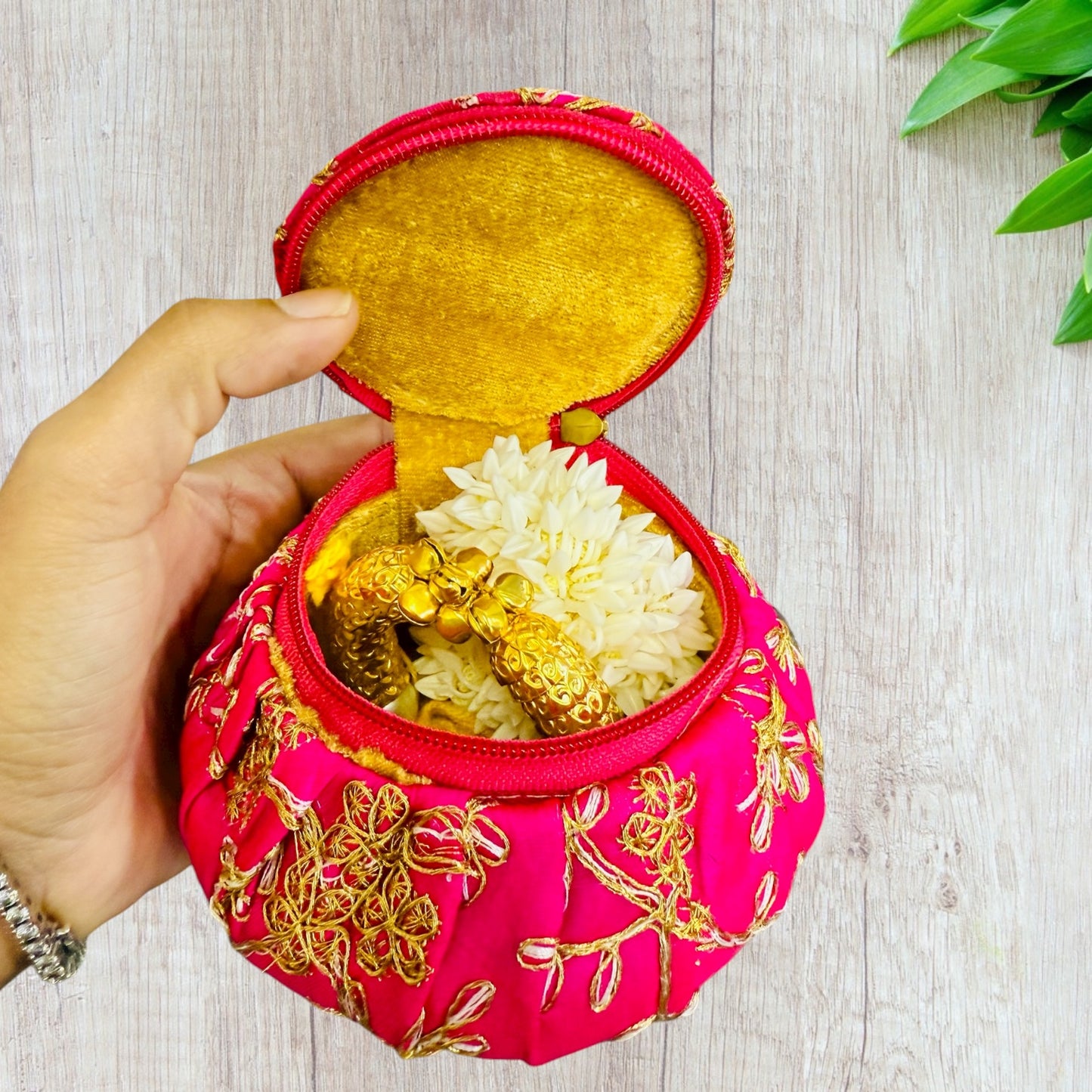 Karwachauth Party Gift - Golden Shell Bracelet, Gajra in Reusable Fabric Matki