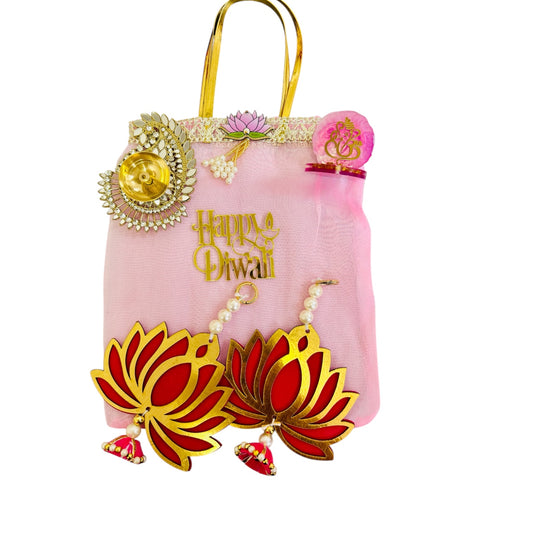 Combo of Akhand Diya, Resin Ganesha, Lotus Hanging in Organza Bag