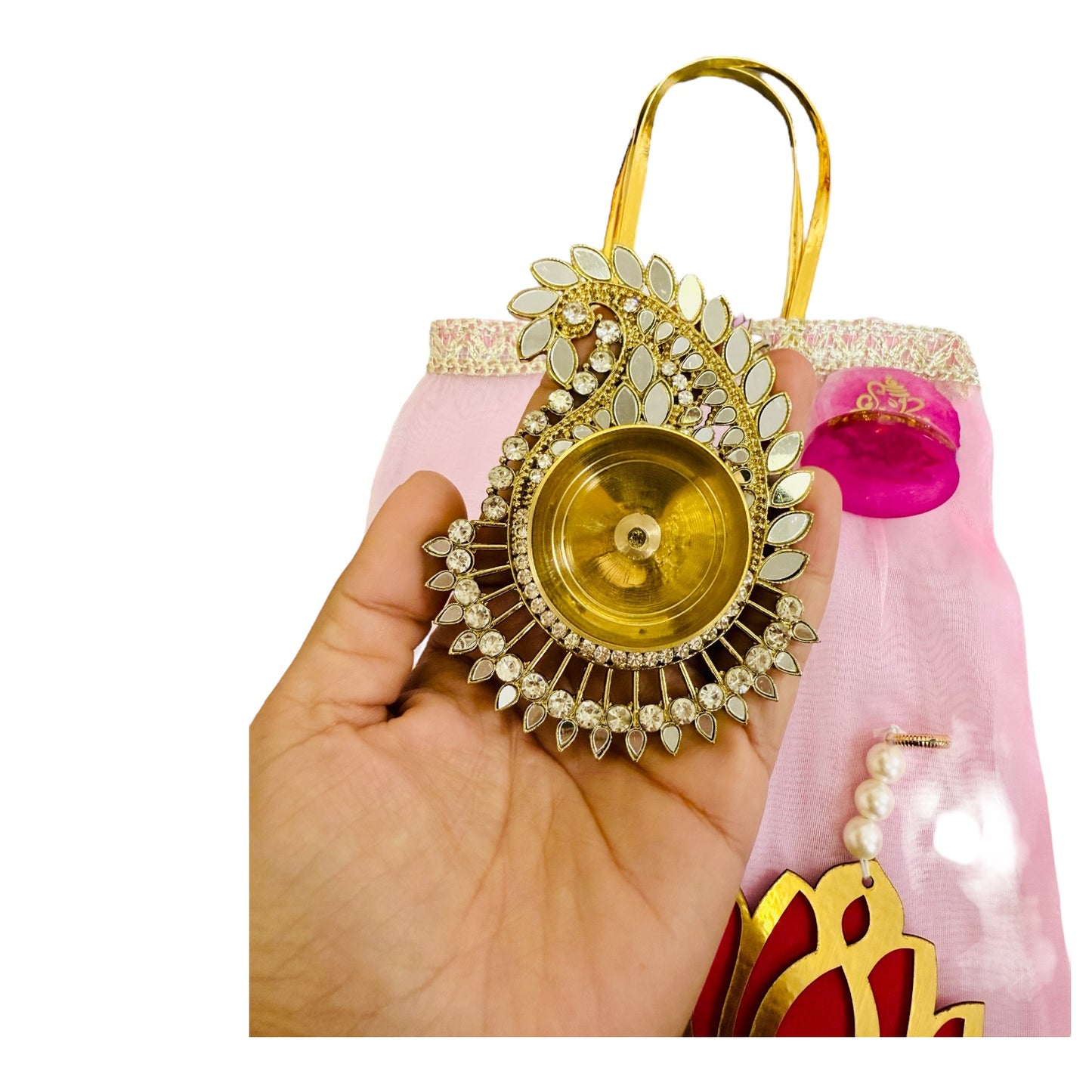 Combo of Akhand Diya, Resin Ganesha, Lotus Hanging in Organza Bag