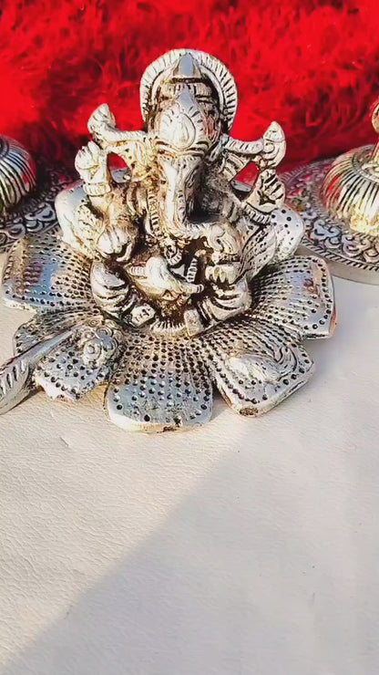 German Silver Ganesh Idol Sitting on Hibiscus Flower